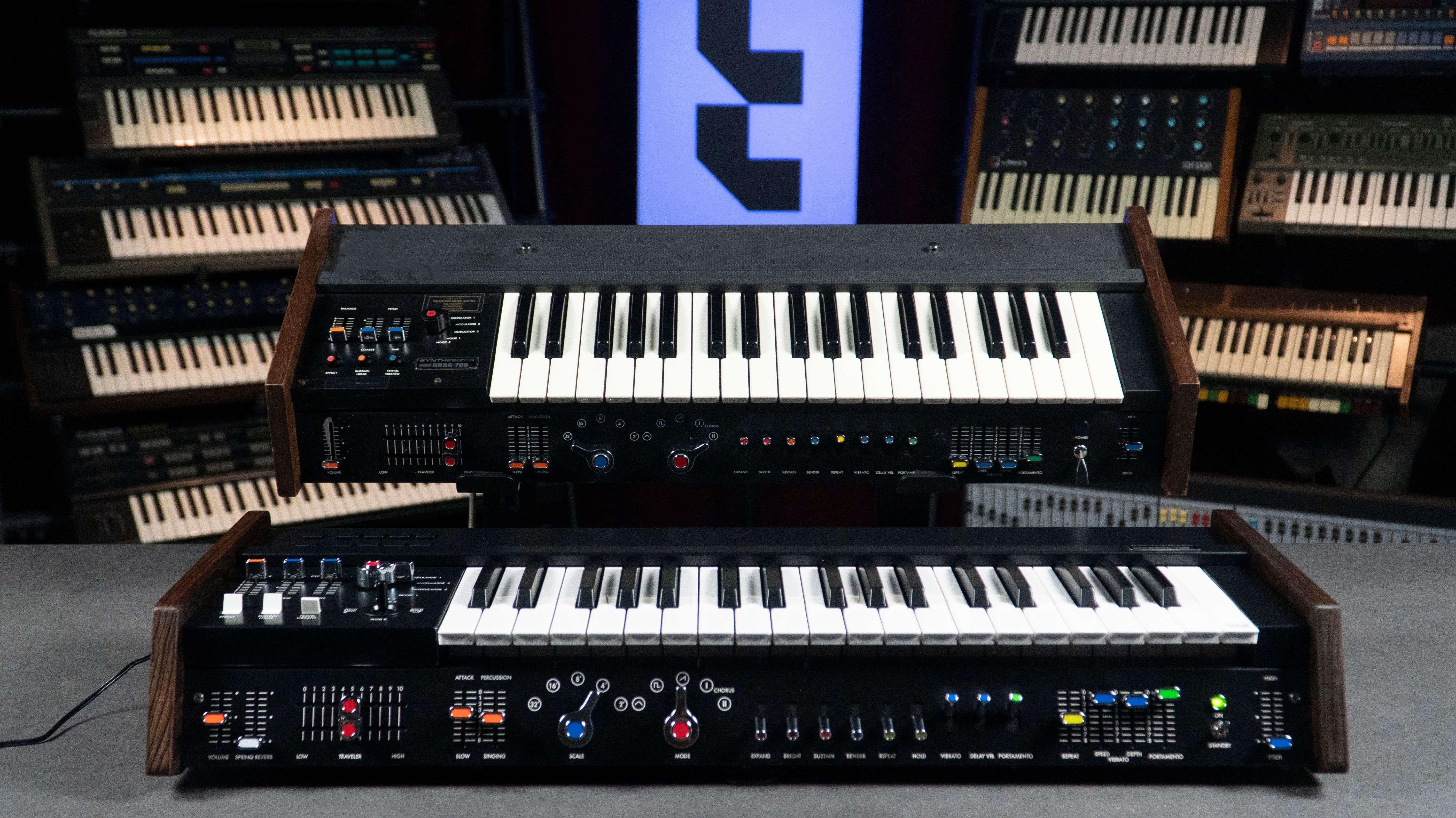 Classic vintage synthesizers in a professional music studio with multiple keyboards in the background.