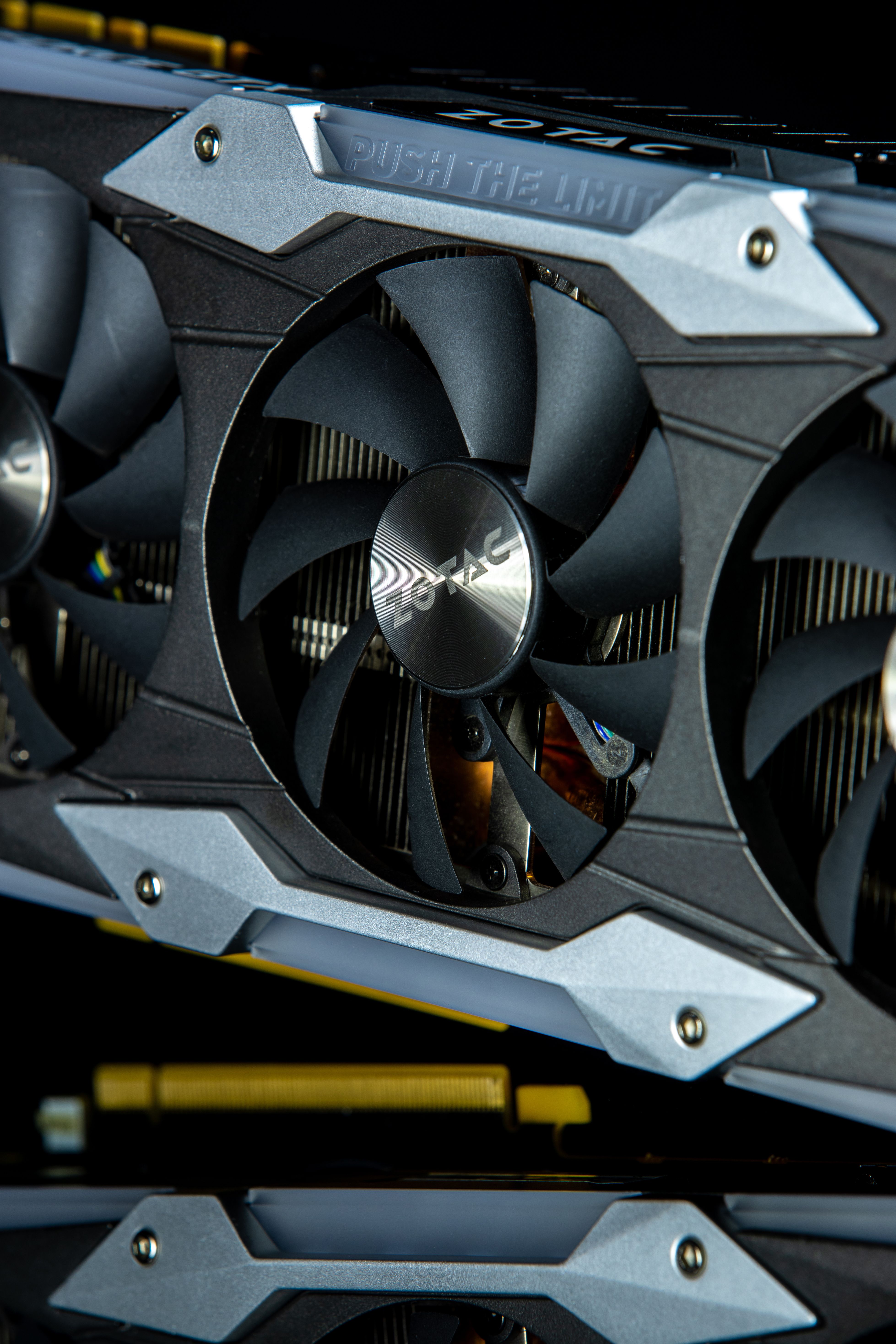 Detailed view of a cooling fan in a ZOTAC video graphics card, showcasing technology and design.
